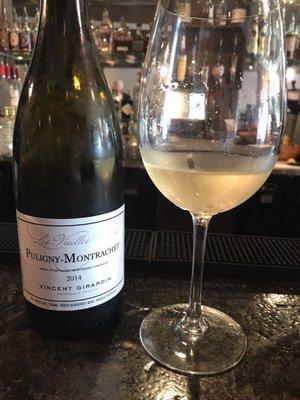 Definitely try the Puligny-Montrachet wine! It's really good and I'm typically a red wine drinker!