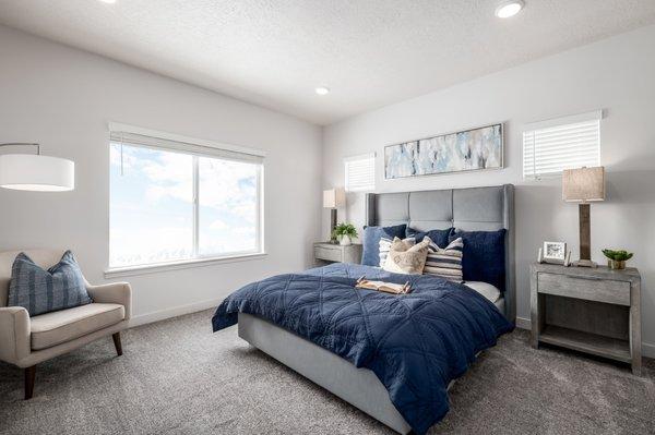 Bedroom with windows letting in natural light