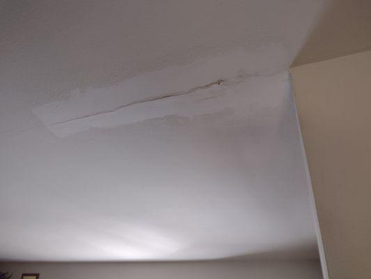 Moldy drywall and cracked patch