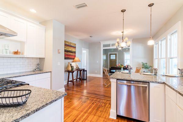 Remodeled Bungalow: View from the kitchen to the dining room. "Shot-gun" view throughout the front of the house.