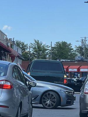 He took my parking spot, she hopped out her car to tell him to move  (there was a FREE parking spot right next to me btw)