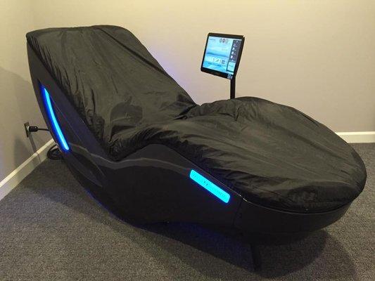 One of our favorite pieces of furniture here: a reclined water massage bed