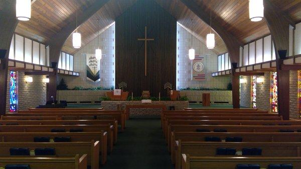 Coming up the aisle of the Sanctuary.