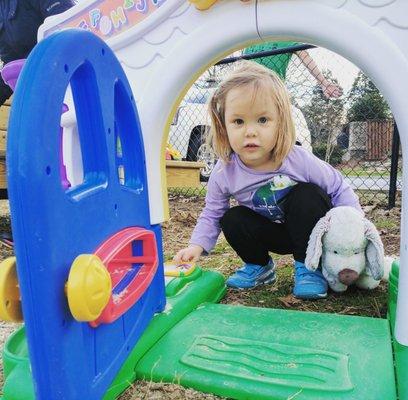 The playground is full of lightly-used toys left behind by other families.