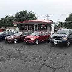 Lot view of the office at Hall of Fame Auto Sales in Loves Park