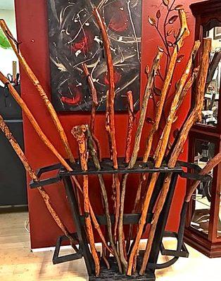 Near a trail? Grab a walking stick! Carved and protected, with a leather hand loop!