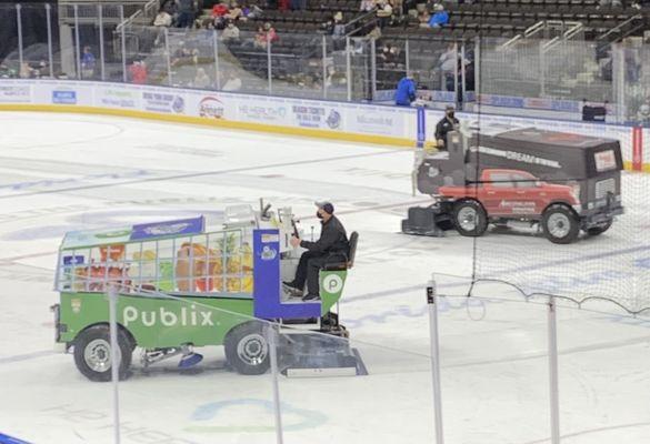 Publix shopping cart and Toyota truck zambonis