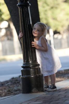 Sara's quick reflexes and amazing eye caught this split second my daughter decided to be a light pole hugger :)