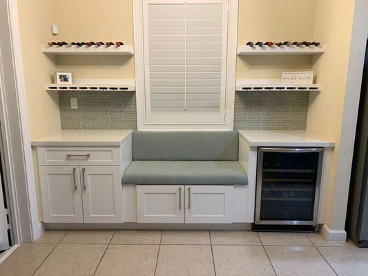 Bar top area white shaker cabinets with white sparkling countertops eased edge 1 1/2.