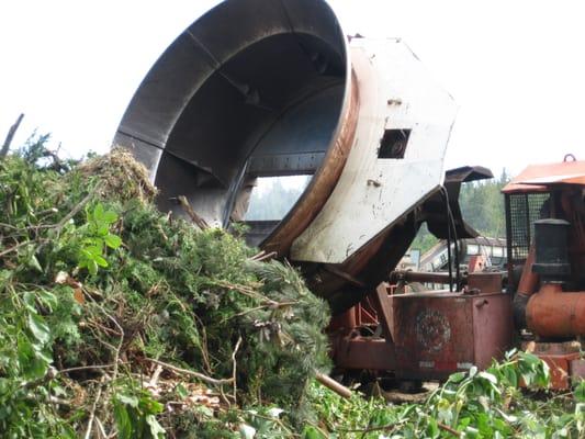 Tub grinder for grinding yard waste.