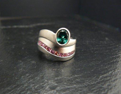 Green tourmaline, padparadscha sapphires in white gold