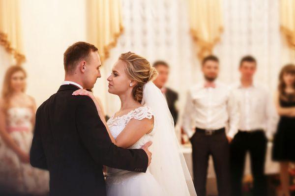 Happy bride and groom with First Dane