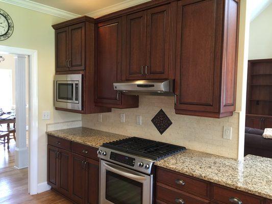 Custom built Cherry cabinets.