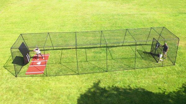 Our Trapezoid Batting Cage 55ft (Batters Box Mat, Pitching Machine Protective Screen, and Bata Pitching Machine sold separately).