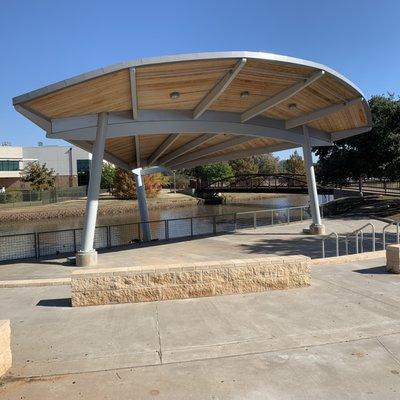 Decorative awning at the Wichita Falls Museum of Art at Midwestern State University with seating for music festivals.