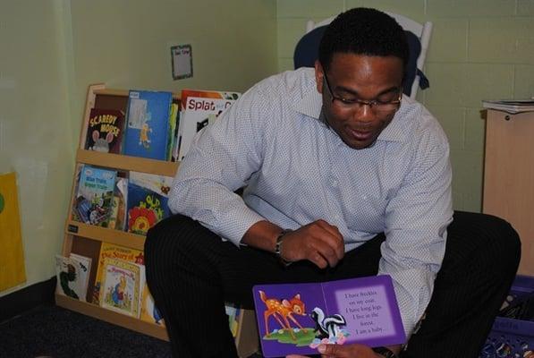 One of our many volunteers sharing "story time".