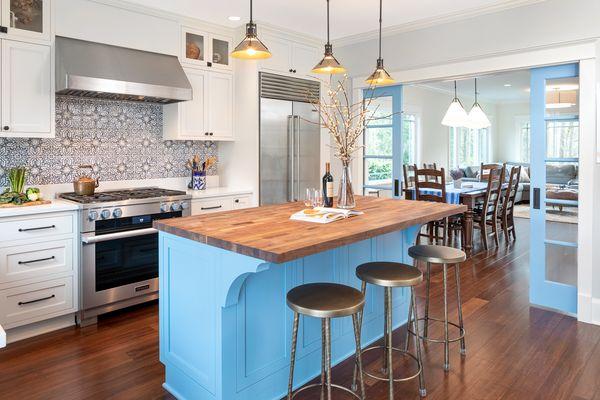 Exquisite chef's kitchen with timeless charm. Design by Raina Henderson Interiors