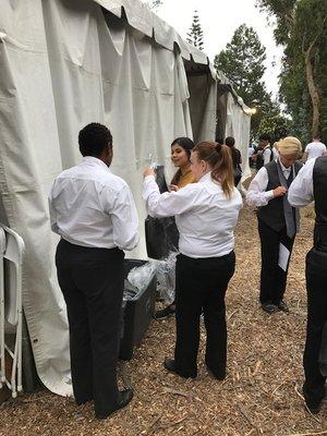 Staff getting ready for a wedding in Malibu