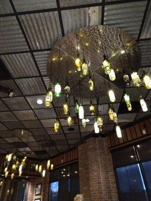 Chandelier made from wine bottles, and that tin ceiling! LOVE!!!!!!