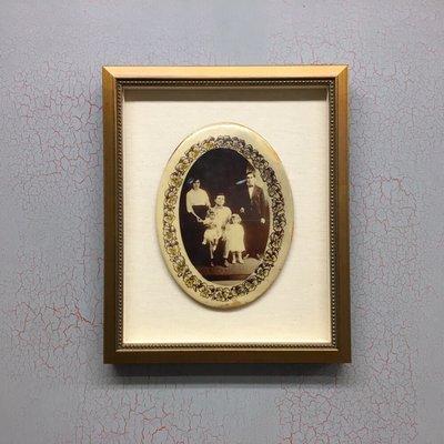 Early 20th century enamel "button" family portrait in a custom shadow box  frame.