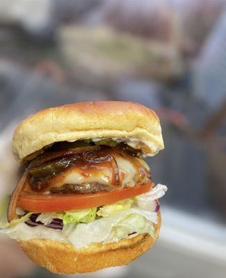 Zapper Burger
1/4 lb fresh pressed beef patty, pepper jack cheese, sauteed onions and jalapenos smothered in bbq sauce.