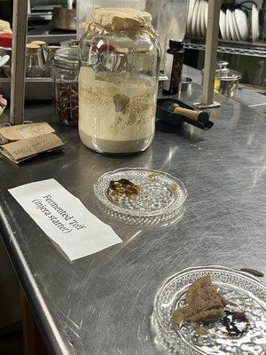 A piece of injera bread with injera starter