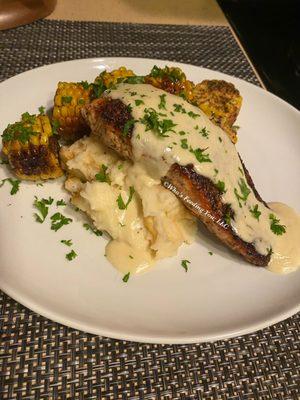 Blackened Salmon over Smoke Gouda Mashed Potatoes, Roasted Corn, w/ Lemon Butter Cream Sauce