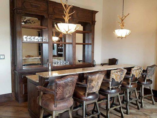 Catrina's Interiors' western bar installed in a new construction ranch house