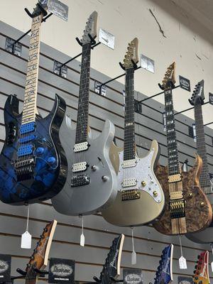 Polyphia signature model versions for Tim Henson and Scott LePage