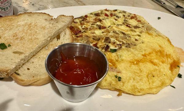 Omelet with sausage and cheese added