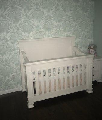 Nursery complete with Farrow and Ball Paint and wall paper.