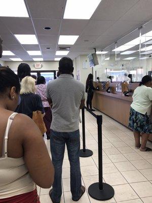 Waiting in line at Bank of America inside to make deposits on a daily basis takes more than 30 minutes. Only 2 tellers