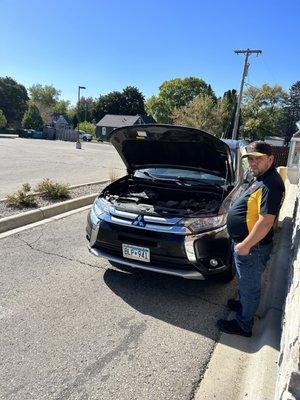 Owner/worker stalking me and my vehicle while I waited for a tow truck.