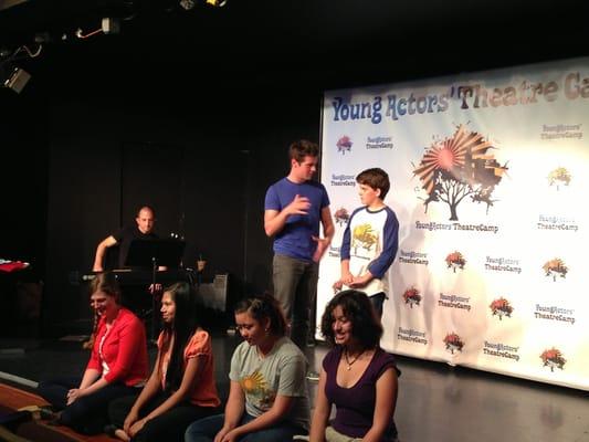 Tony nominated actor, Jonathan Groff, teaching a vocal master class at the Young Actors' Theatre Camp.