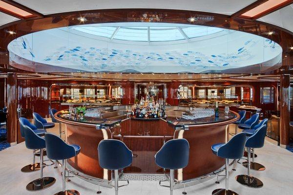 Seabourn's understated chic bar sits perfectly under a glass dome.