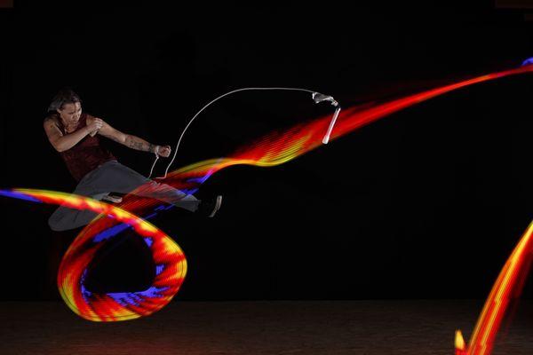 Xander's amazing flying kick with his LED vision rope dart.