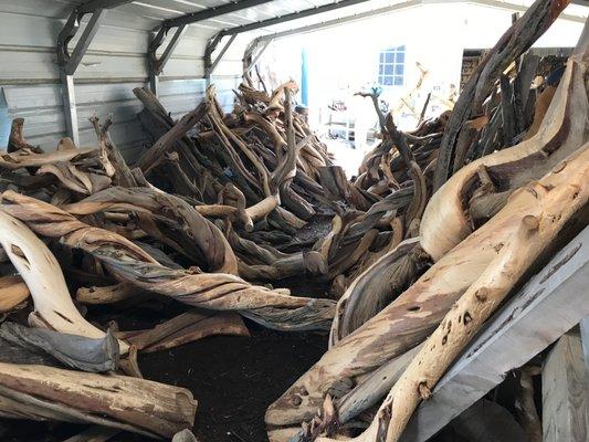 Juniper pieces waiting to be used or carved.