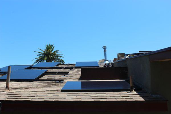 Rooftop solar panels being installed