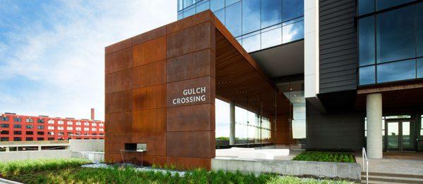 Custom patina sign at Gulch Crossing in Nashville by Ortwein Sign