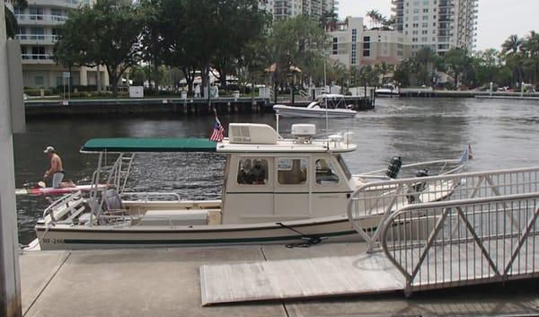 My boat docked in the small boat docking area on the New River.