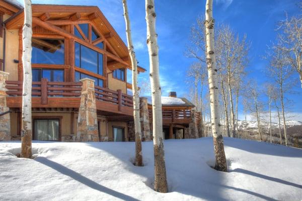 Ski in ski out Colony Home For Sale on 10+ acres with stream and valley views.