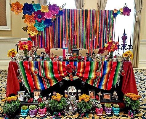 Main court table for the Dias's de los muertos sweet 16 theme.