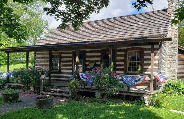 The Yanda Cabin has an information panel on the porch that discusses its importance to Glen Carbon.