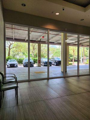 The entrance door from inside the lobby.