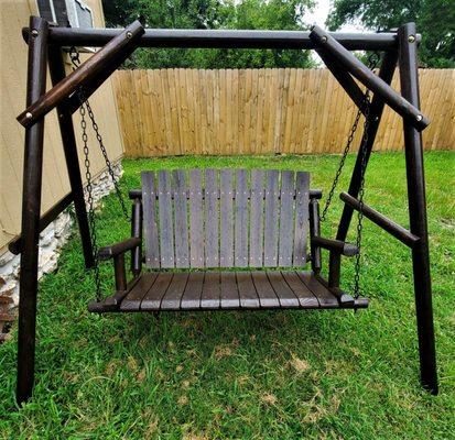 Close-up of our new log cabin style swings!