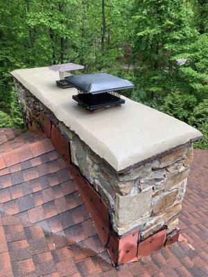 Chimney cap looks like a wedding cake baker made it.