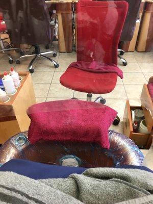 Sitting in a pedi and massage chair