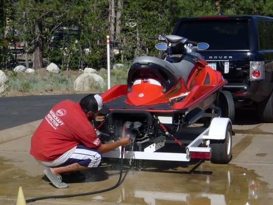 Watercraft Inspector decontaminating a personal watercraft at Meyers Inspection Station