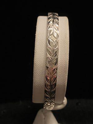 Diamond cut Maile scroll with no edge