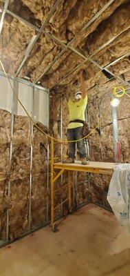 Our team working on Washington Middle Schools wall and ceiling insulation.